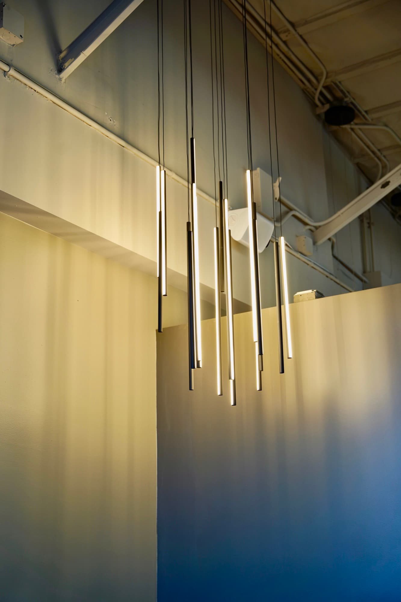 Detail of LED pendant tube lights installed by Falcon Electric